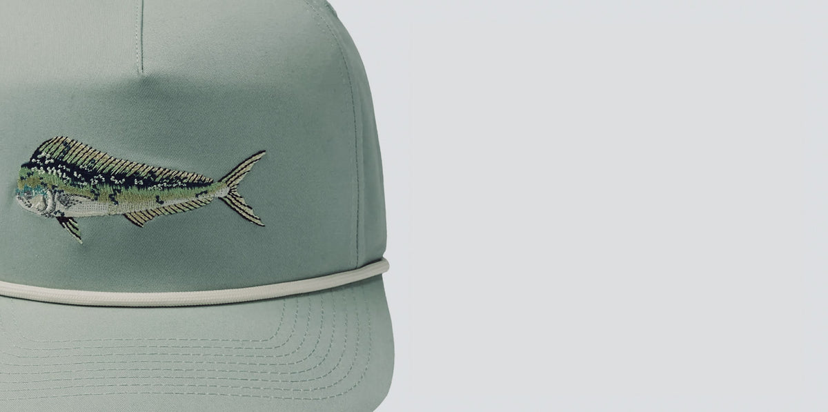 Sage green rope hat with an embroidered fish