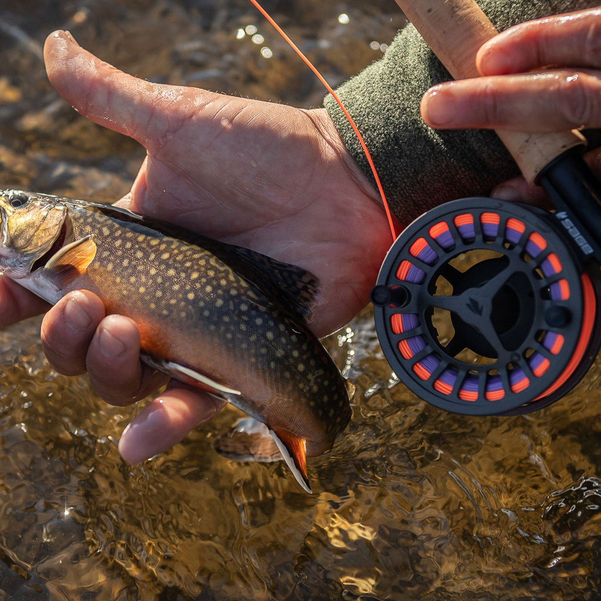 custom made fly fishing reels Hatch Camo Iconic Large Arbor Reel 7 Plus The frame is accented by a machined silhouette of the Colorado mountains in Ross Reels backyard Custom Fly Fishing Rod Package